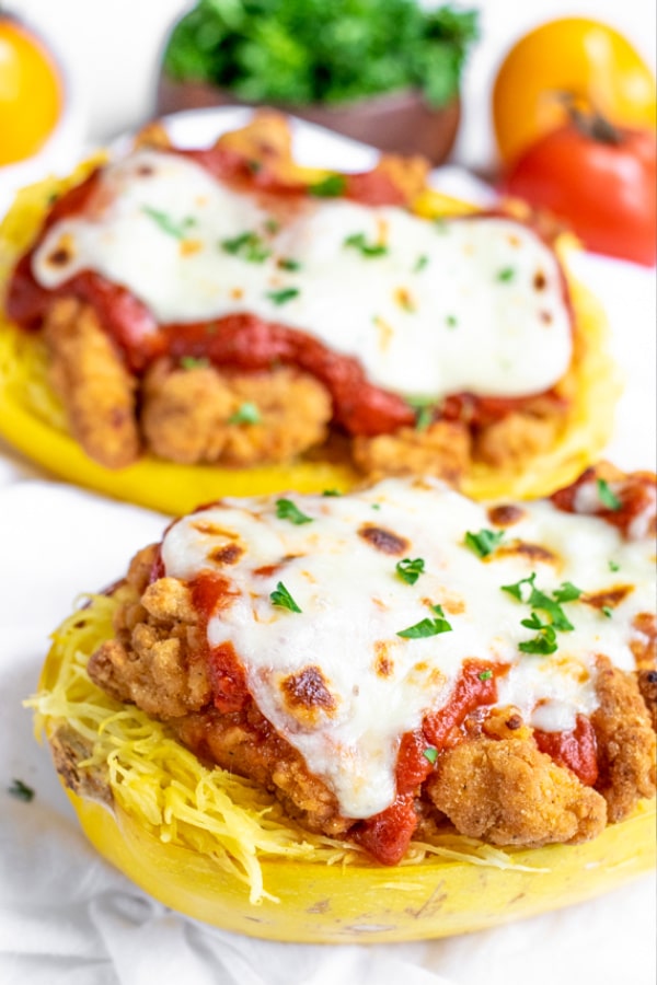 Chicken Parmesan roasted spaghetti squash served in the cooked squash