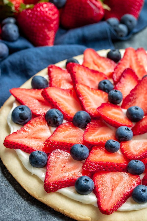 layered strawberries and blueberries make a Red, White & Blue Fruit Pizza
