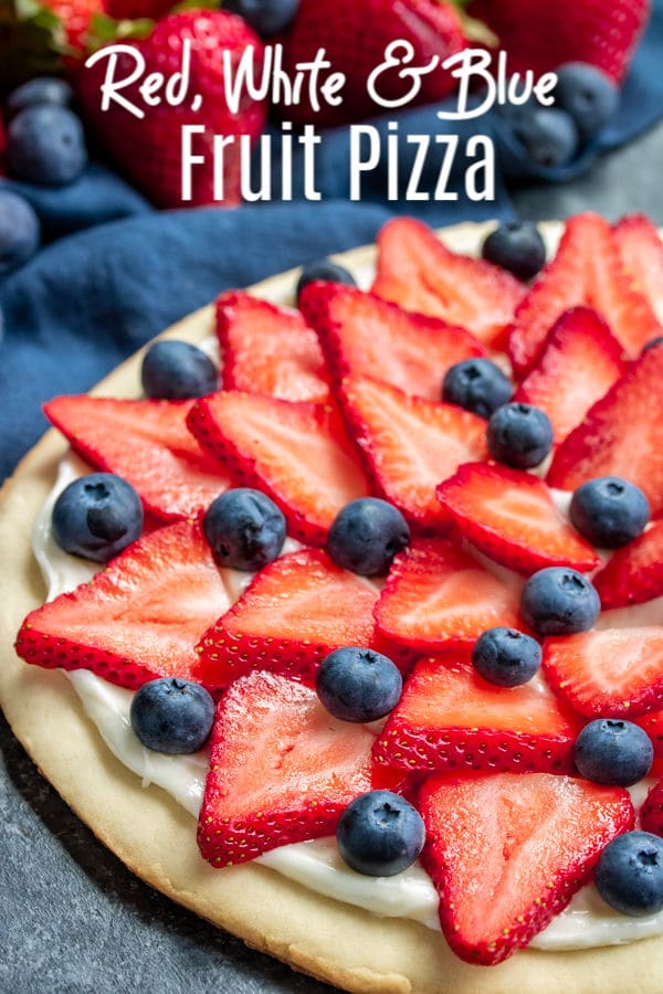 This Red White and Blue Fruit Pizza is an easy fruit pizza recipe for 4th of July parties! Fresh fruit, sweet cream cheese frosting, and a sugar cookie crust make this the perfect summer dessert. Make this dessert pizza with fresh fruit for Memorial Day, Labor Day, or 4th of July dessert. A soft, homemade sugar cookie topped with frosting, strawberries and blueberries, makes a beautiful and delicious dessert. #4thofjuly #fruit #cookie #homemadeinterest