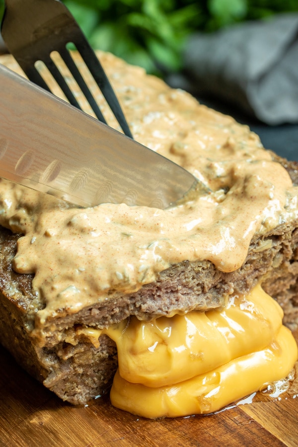 cutting Big Mac Keto Meatloaf with cheese