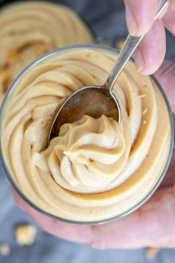 spoon full of creamy Keto Peanut Butter Mousse