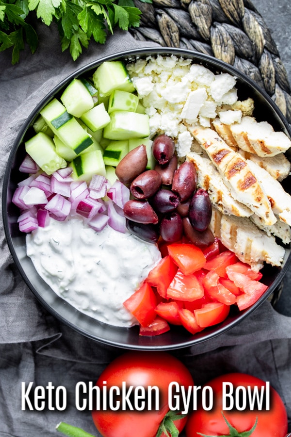 This healthy Keto Chicken Gyro Bowl is a low carb recipe that makes a great lunch or dinner idea. A Greek marinade gives the grilled chicken it's flavor and it is tossed with olives, feta, tomato, and cucumbers. It's served with tzatziki sauce as the dressing. Toss together and you have a delicious keto salad! #gyro #chicken #ketorecipes #lowcarbdiet #lowcarb #keto #bowl #homemadeinterest