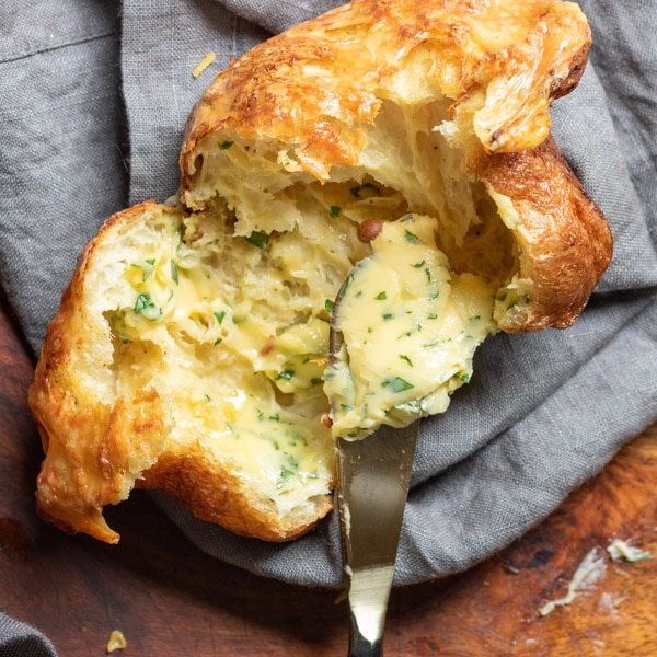 spreading butter on Gruyere Popovers