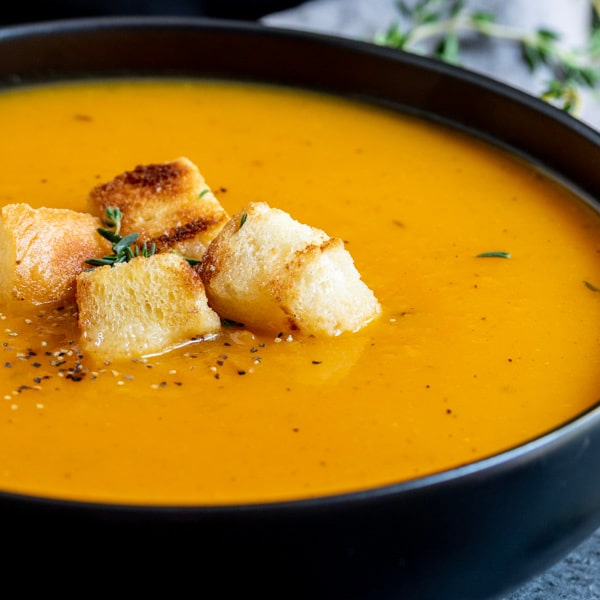 bowl of Instant Pot Butternut Squash Soup topped with croutons