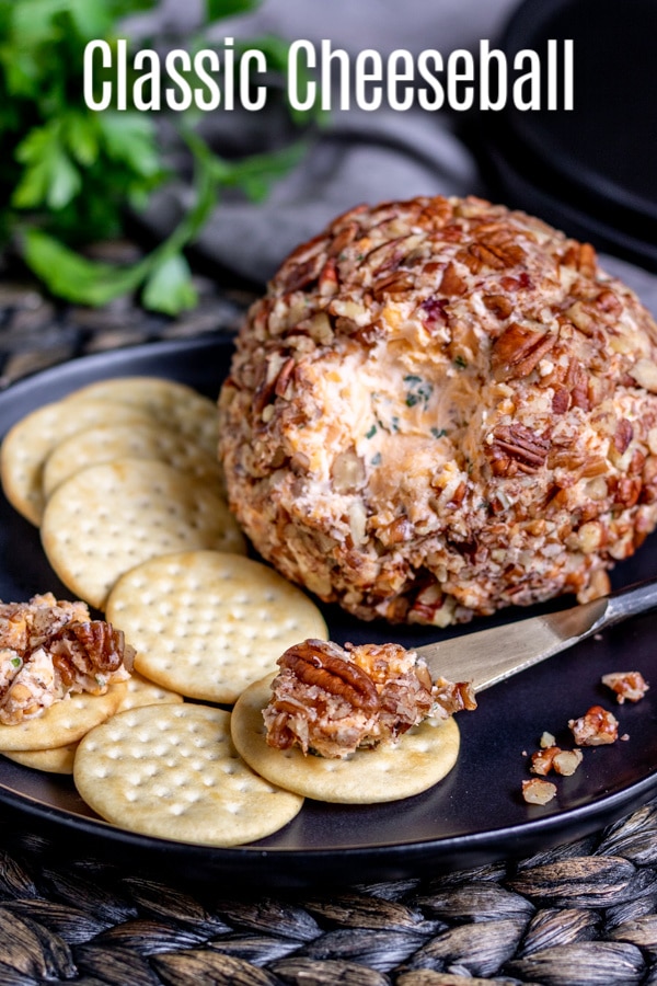 This Classic Cheese Ball recipe is the BEST! Just a few simple ingredients is all it takes to make this delicious cheese ball rolled in pecans. It's the perfect holiday appetizer that is low carb, keto, gluten-free, and super easy to make! Serve this as an easy Thanksgiving appetizer, Christmas appetizer, or New Year's Eve appetizer with a plate of veggies and crackers. #cheese #lowcarb #thanksgiving #christmas #newyearseve