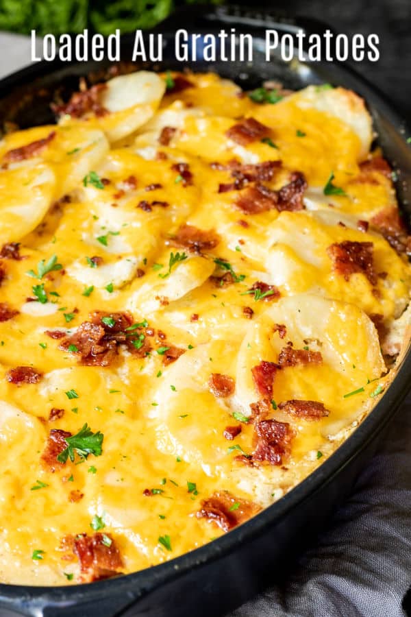 This Loaded Au Gratin Potatoes recipe is a cheesy, creamy au gratin potatoes recipe filled with sour cream, cheddar cheese, and bacon. Everything you love in a loaded baked potato turned into a delicious potatoes au gratin recipe. This is an amazing potato recipe for a Thanksgiving side dish or Christmas side dish. #potatoes #cheese #sidedish #thanksgivingsidedishes #Thanksgiving #christmasrecipes #christmas #homemadeinterest