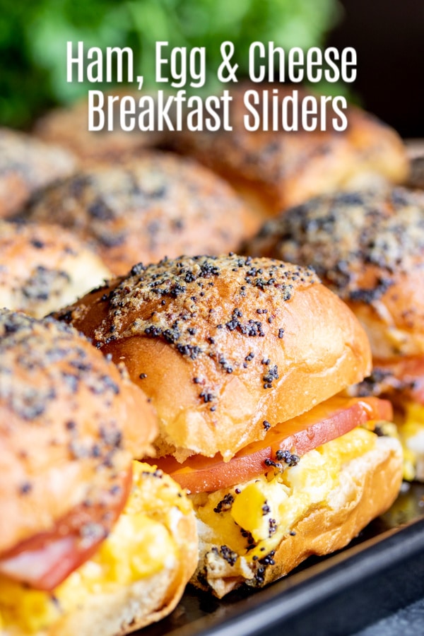 These delicious Ham Egg and Cheese Breakfast Sliders are an easy breakfast recipe or brunch recipe that is a great way to use up leftover ham from Easter or Christmas. Make these breakfast sliders with Hawaiian rolls, ham, egg, and cheese for an early morning tailgating recipe or for Sunday brunch. #breakfast #brunch #ham #cheese #egg #breakfastsandwich #sliders #homemadeinterest