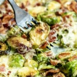 Cheesy Bacon Brussels Sprouts on black fork