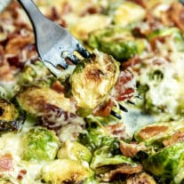 Cheesy Bacon Brussels Sprouts on black fork