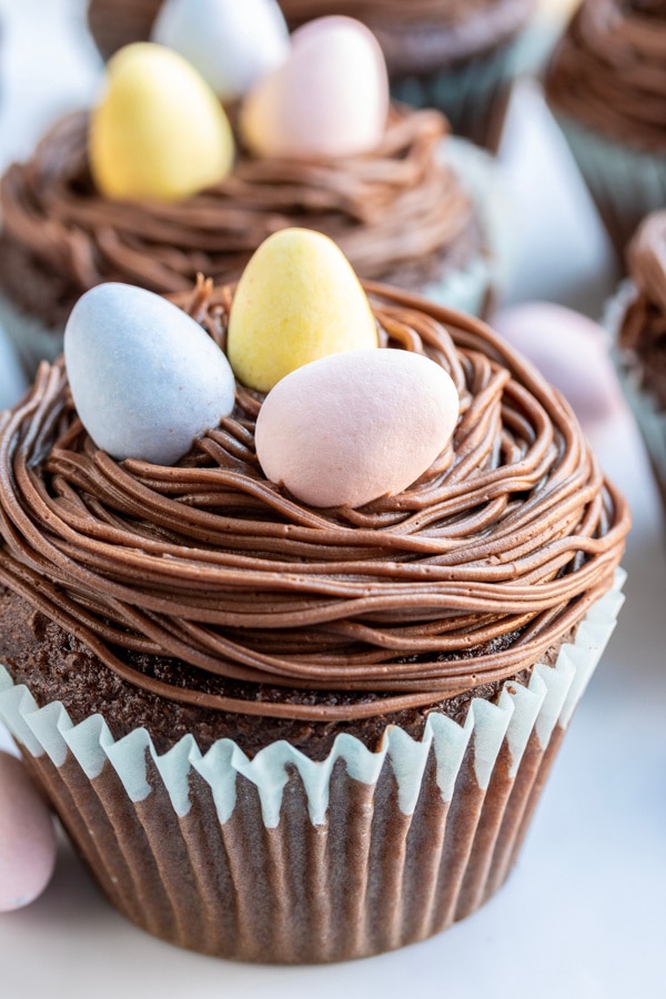 Bird’s Nest Easter Cupcakes are chocolate frosted Easter cupcakes