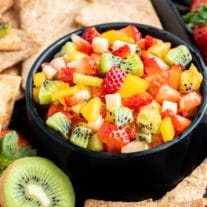 black bowl of Fruit Salsa with Cinnamon Chips
