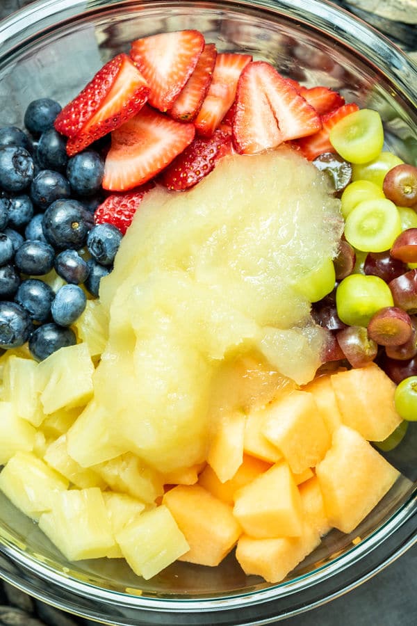 Ingredients for Lemonade fruit salad in a bowl