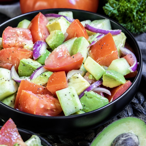 Pinterest image for Cucumber Tomato Avocado Salad with title text