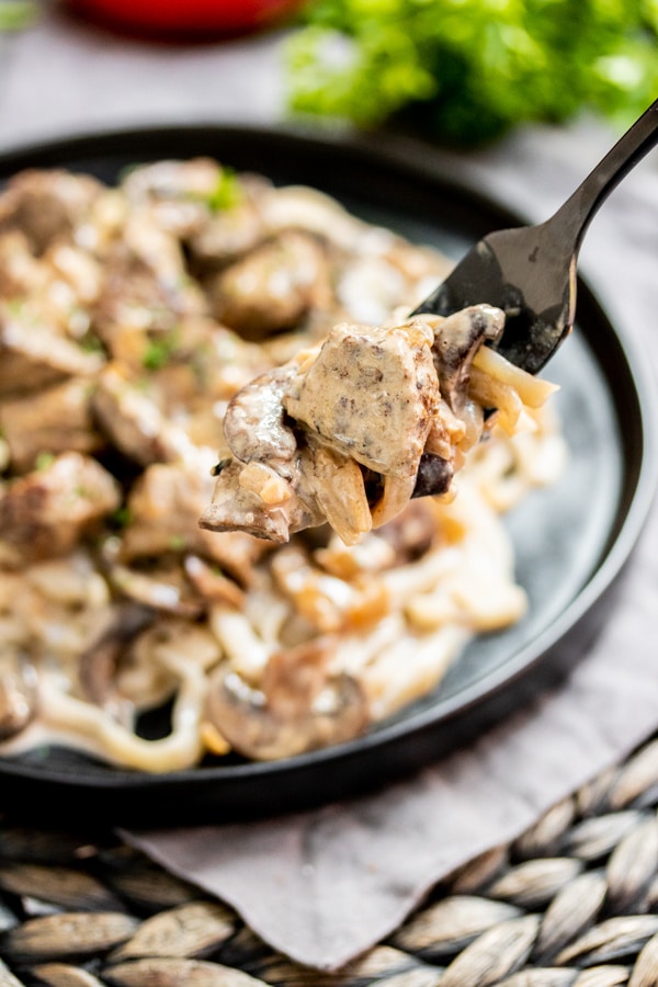 Keto Beef Stroganoff on a fork with keto noodles