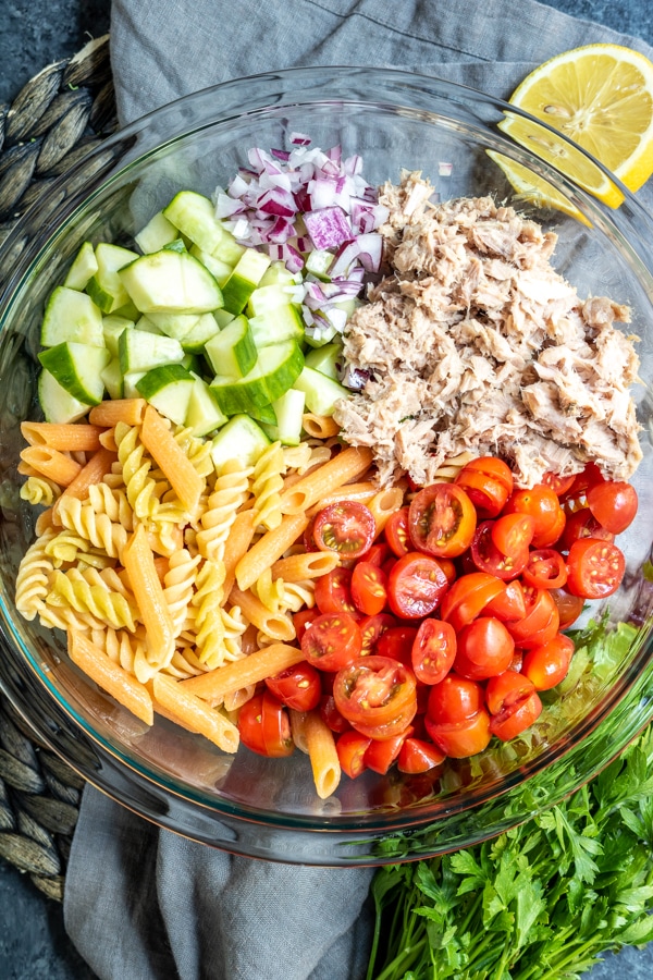 Tuna Pasta Salad ingredients in a glass bowl