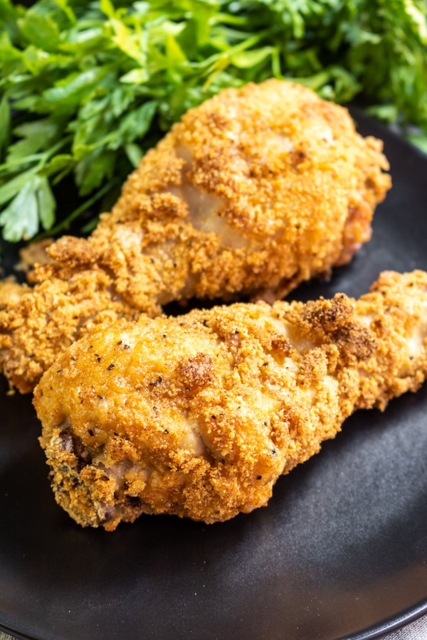 Keto Fried Chicken drumsticks on a plate