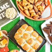 A football party with food and snacks on a table.