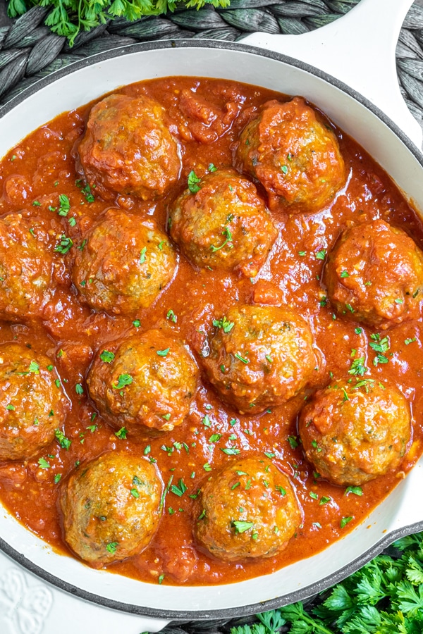 Baked Turkey Meatballs in a white skillet