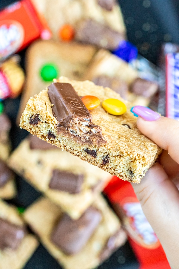holding Candy Bar Cookie Bars with kit kats