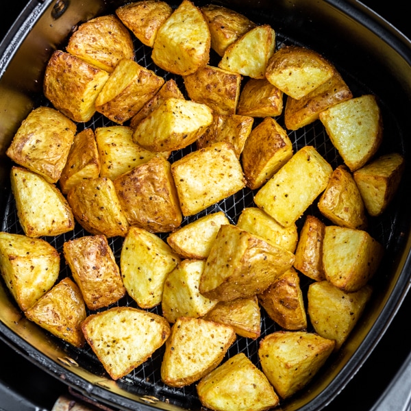 air fryer basket with Crispy Air Fryer Potatoes