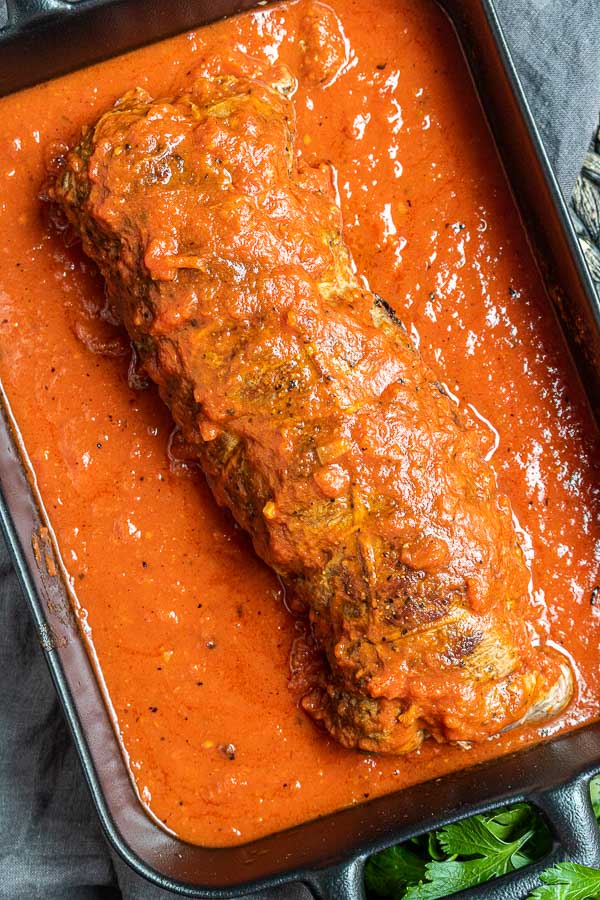 Beef Braciole covered in sauce
