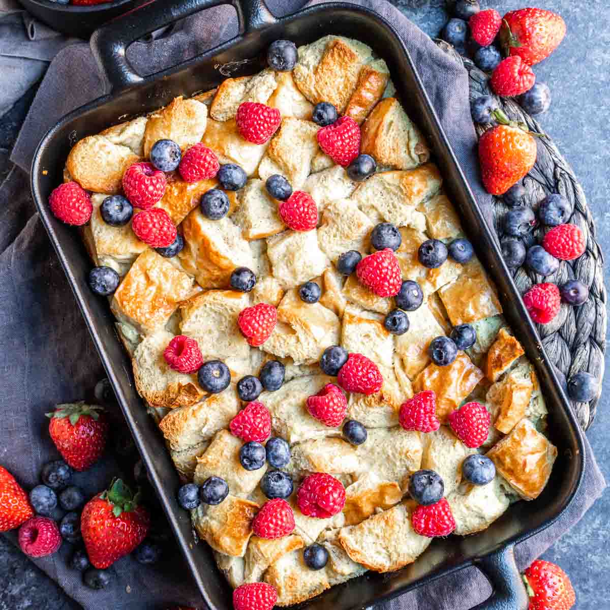 platter with Overnight French Toast Bake topped with fresh berries
