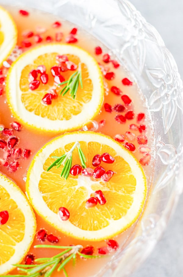 Christmas Punch in a punch bowl with orange slices