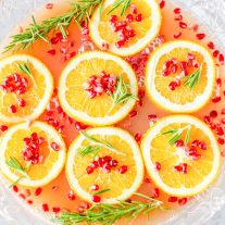 punch bowl with Christmas Punch with floating orange slices