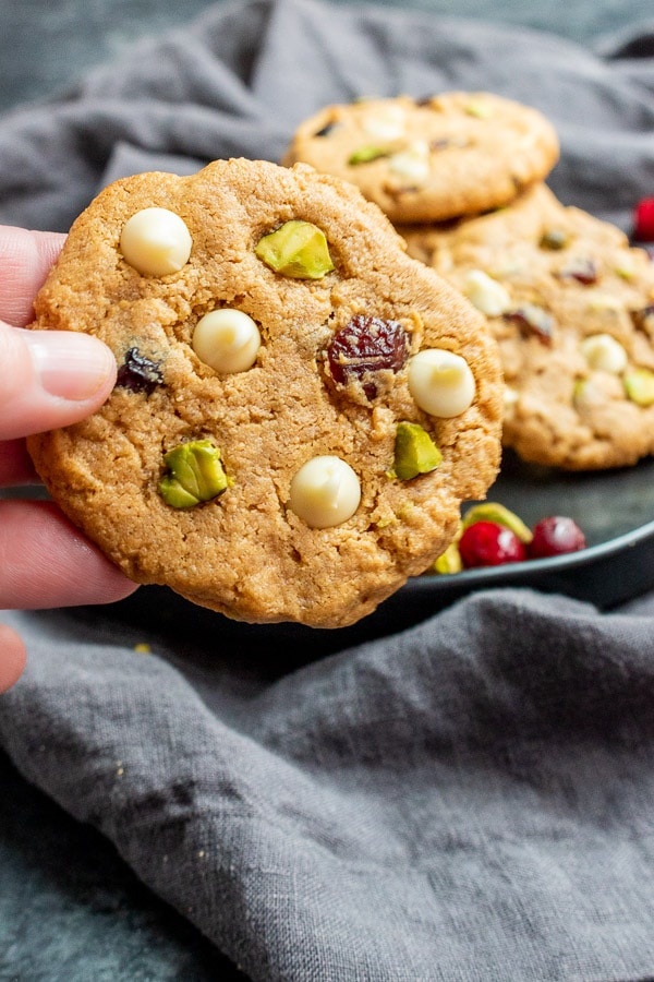 holding Keto Pistachio and Cranberry Cookies