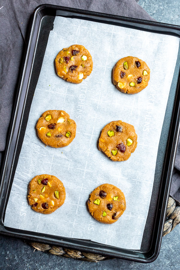 raw Keto Pistachio and Cranberry Cookies on sheet pan