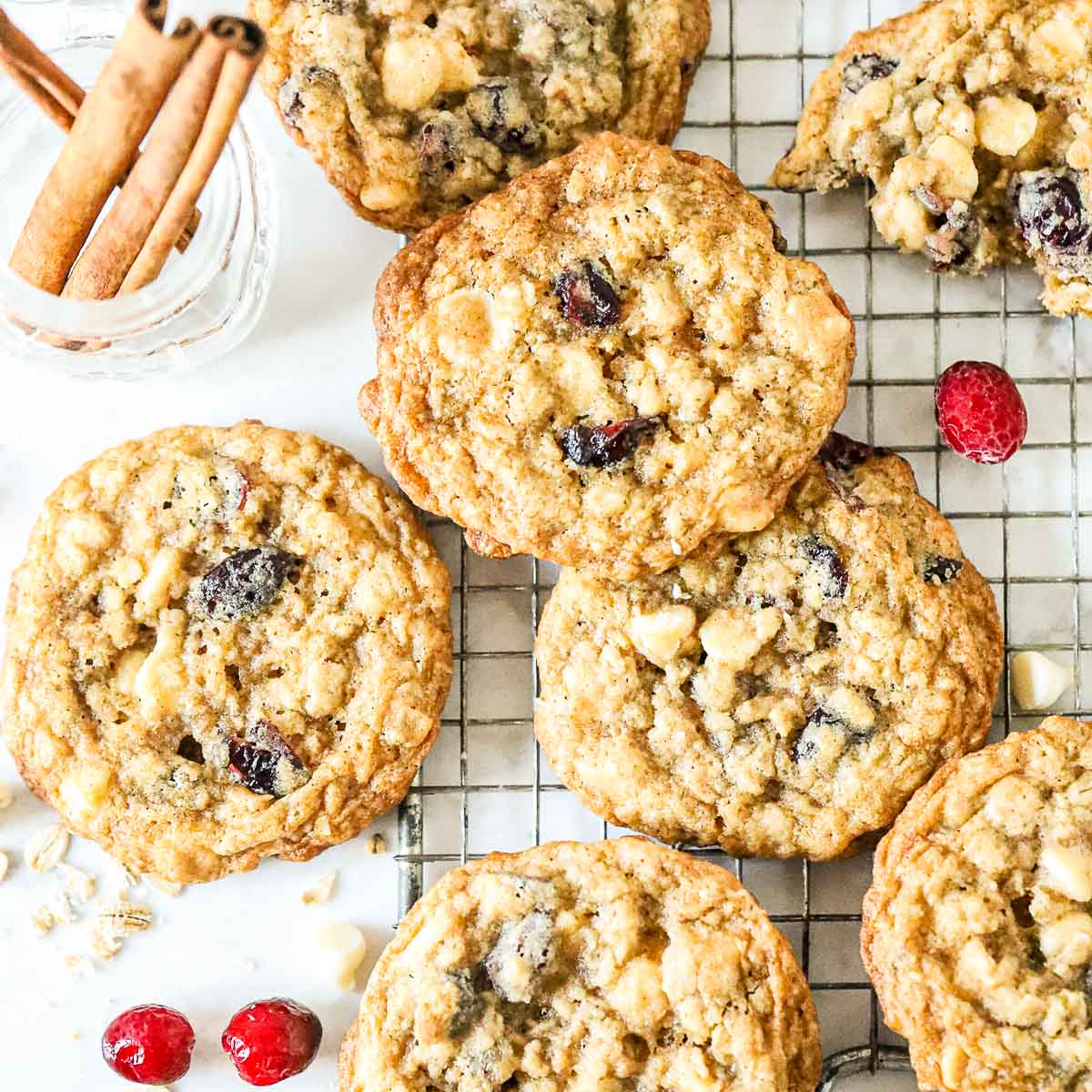 Top down shot of White Chocolate Oatmeal Cranberry Cookies on a cookie rack