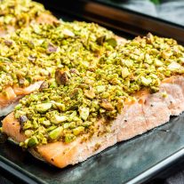 Close up of a pieces of pistachio crusted salmon