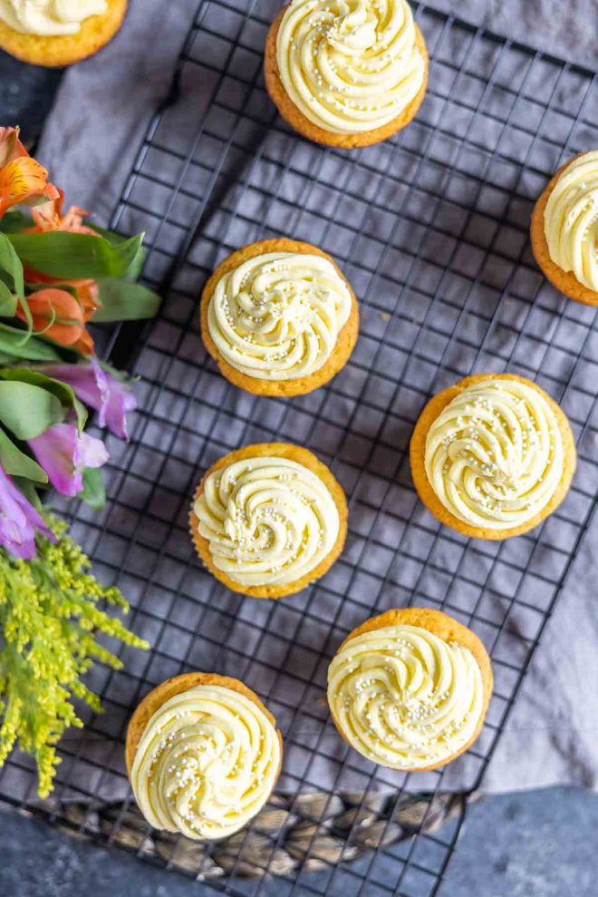 top down of several lemon cupcakes on a cool rack