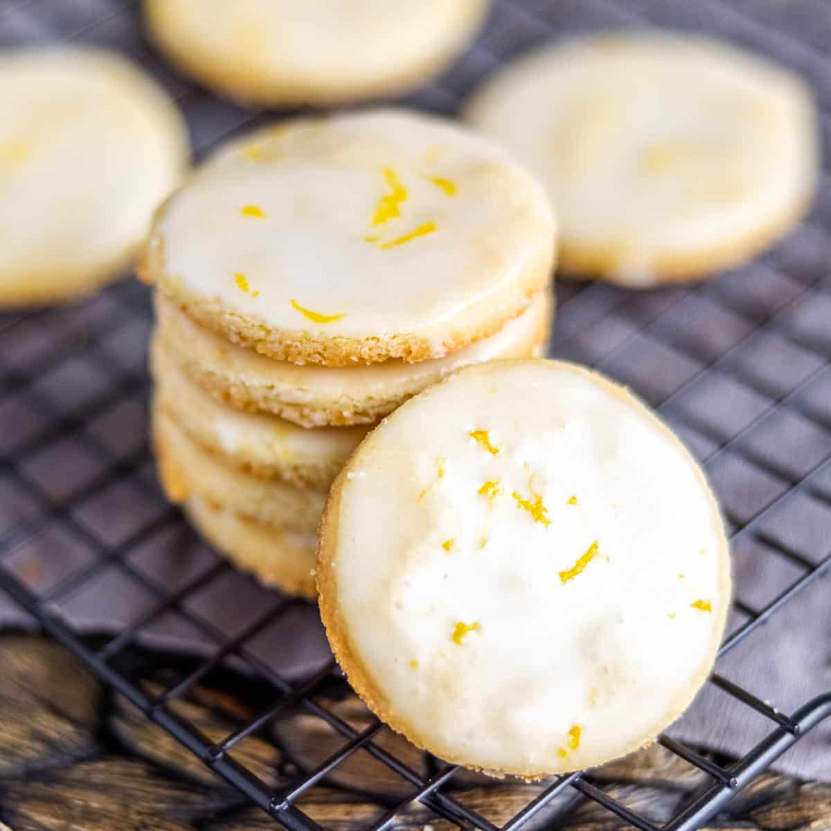 Lemon Shortbread Cookies stacked on cooling rack