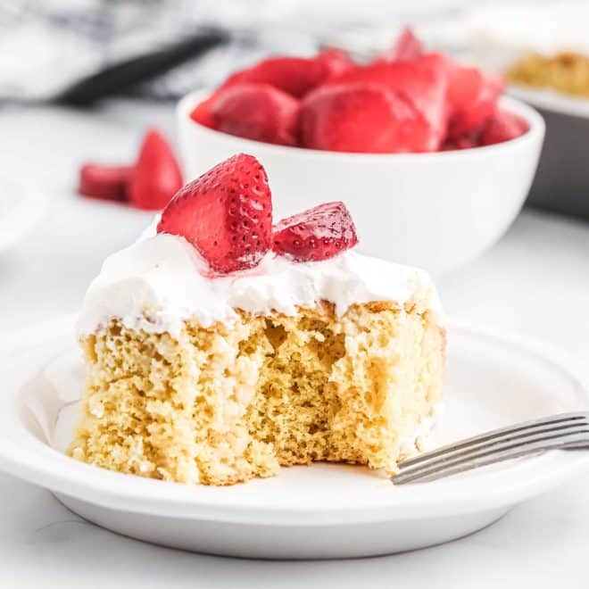 Tres Leches Cake on a plate with a fork