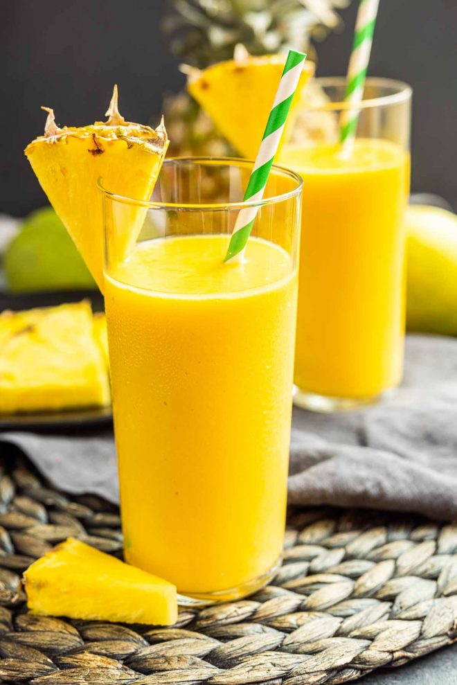 Mango Pineapple Smoothie with pineapple wedge