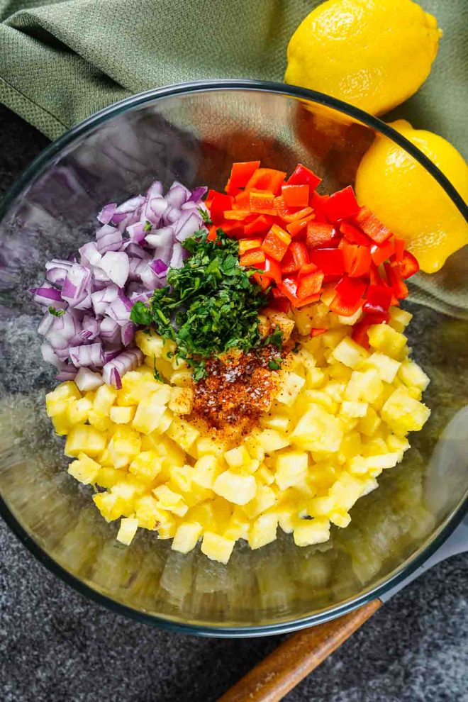 ingredients for Pineapple Salsa in a glass bowl
