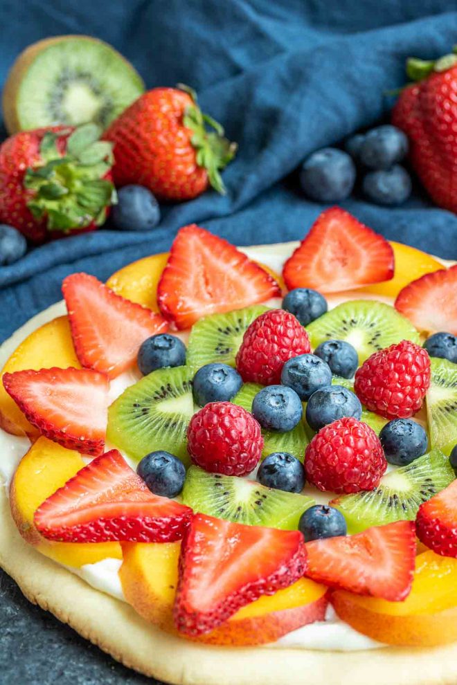 Fruit Pizza layered with fruit on top