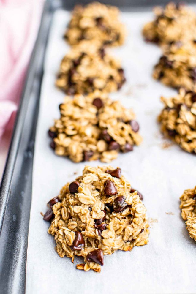 Healthy Oatmeal Cookies on wax paper on cookie sheet