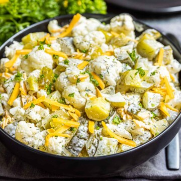 Keto Dill Pickle Salad in a black bowl