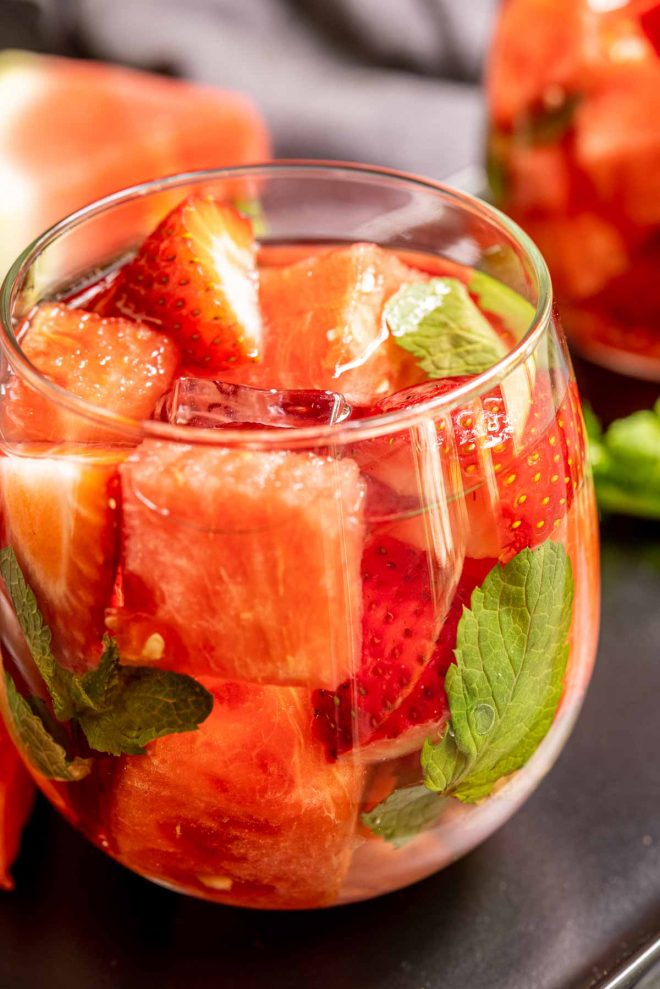 Strawberry Watermelon Infused Water in a glass with mint