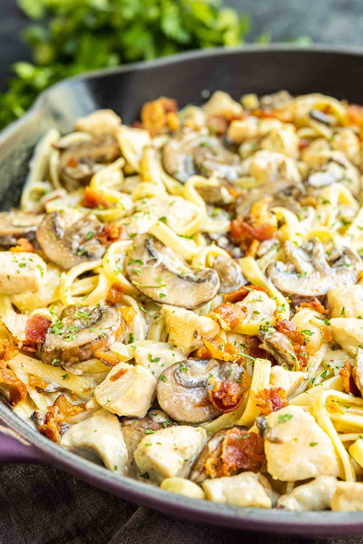 Creamy Chicken and Bacon Pasta in a cast iron skillet