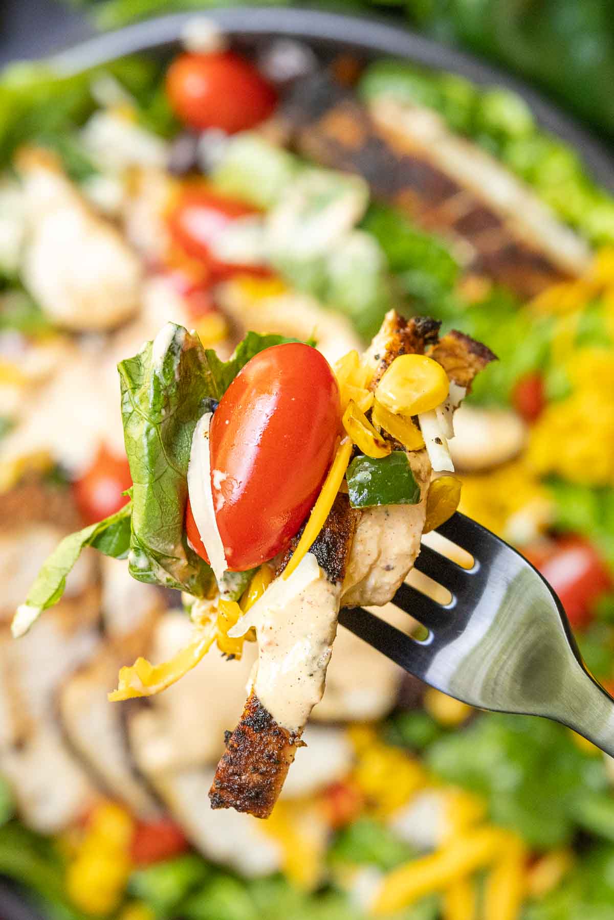 Southwest Salad on a fork with dressing