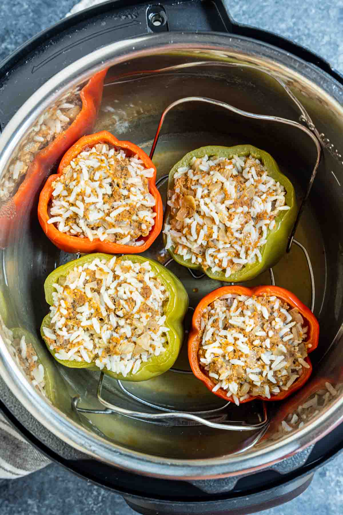 cooked Instant Pot Stuffed Peppers in Instant Pot basket