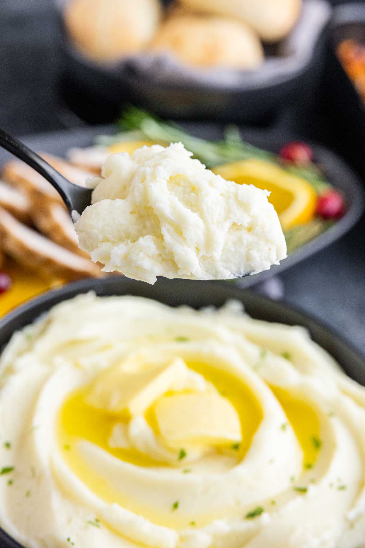 serving Not Your Mom’s Mashed Potatoes on a spoon