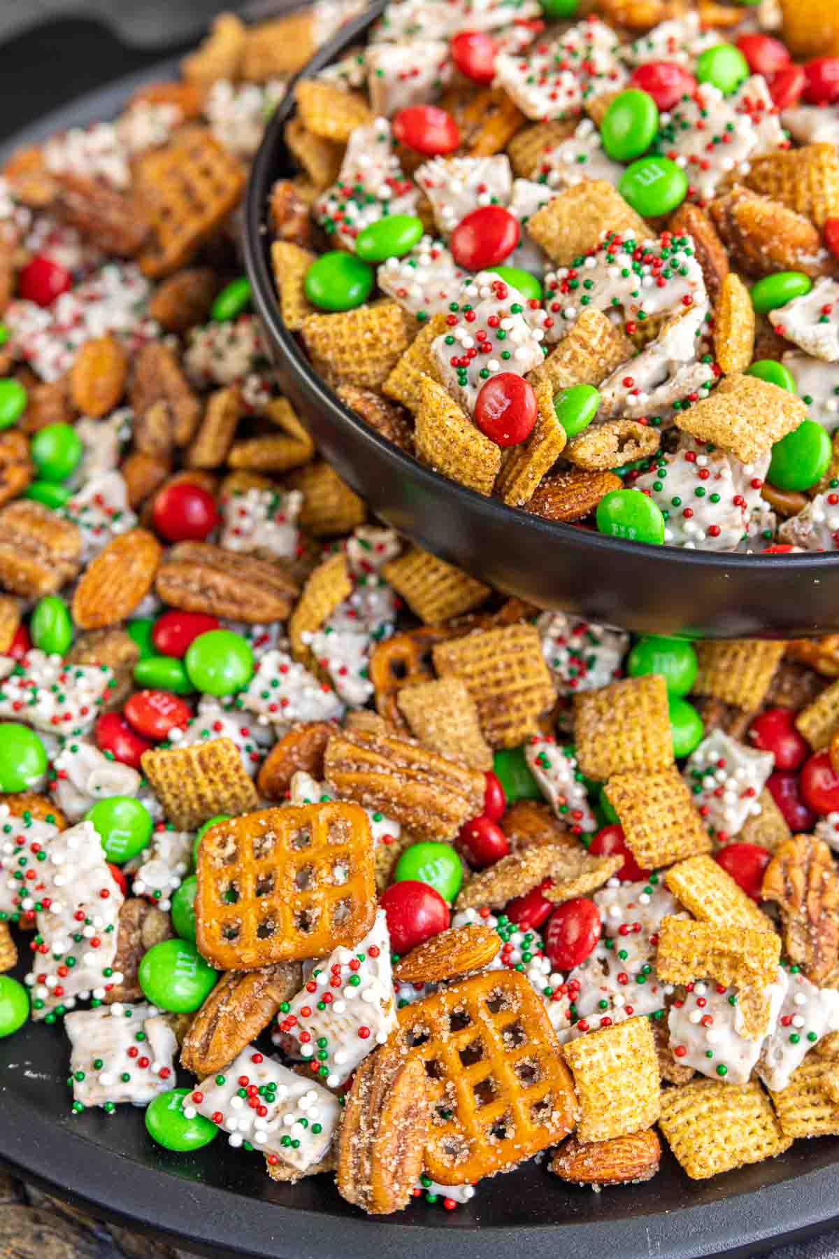 Pretzels, cinnamon sugar chex mix and white chocolate chex cereal tossed with M&Ms