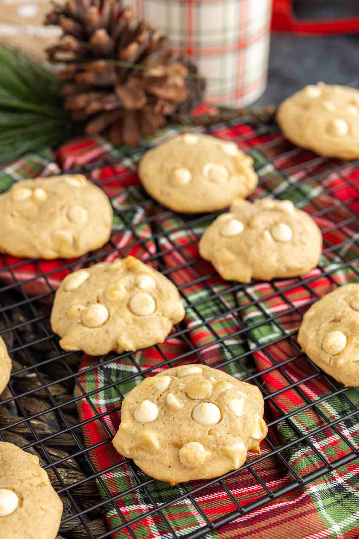 Eggnog Cookies on a cookie rack with a plaid cloth