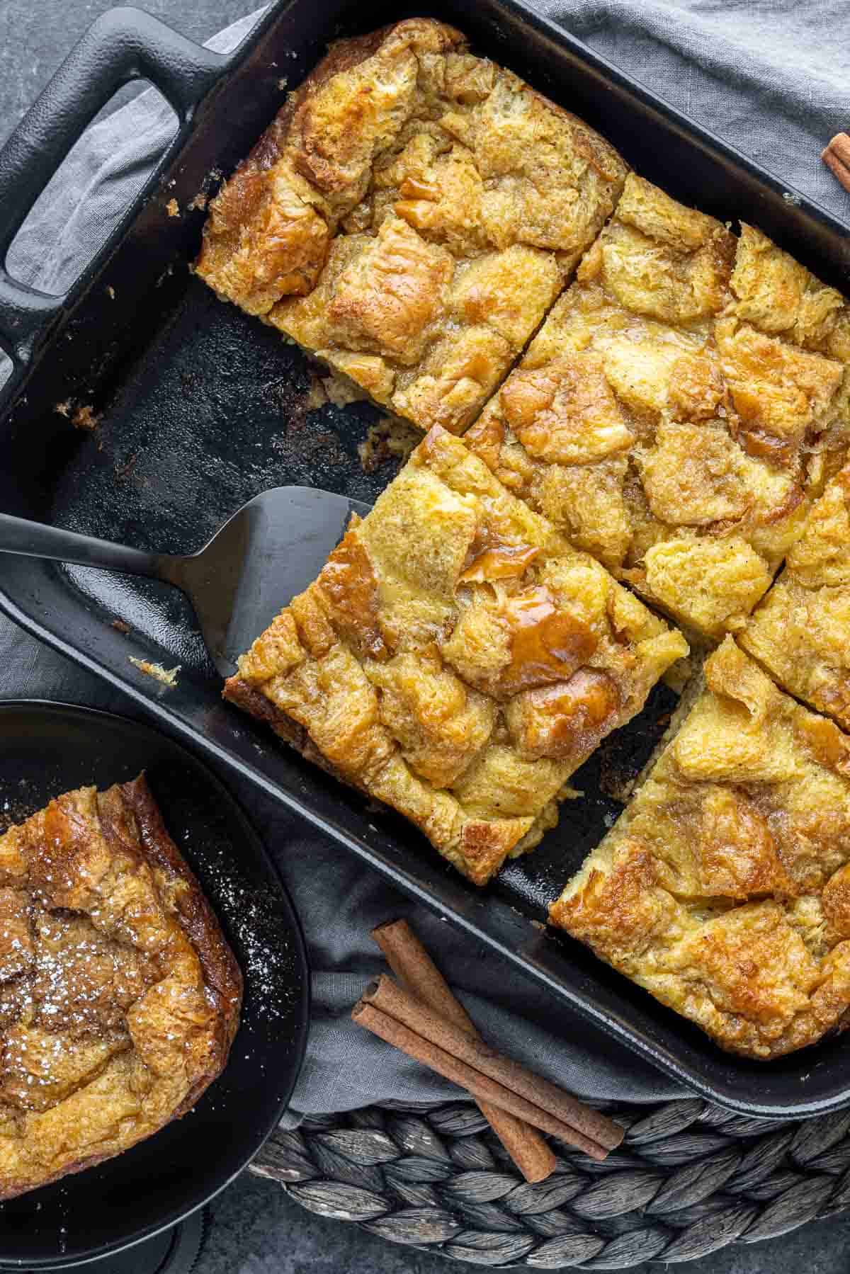 Eggnog French Toast Bake cut into slices in pan