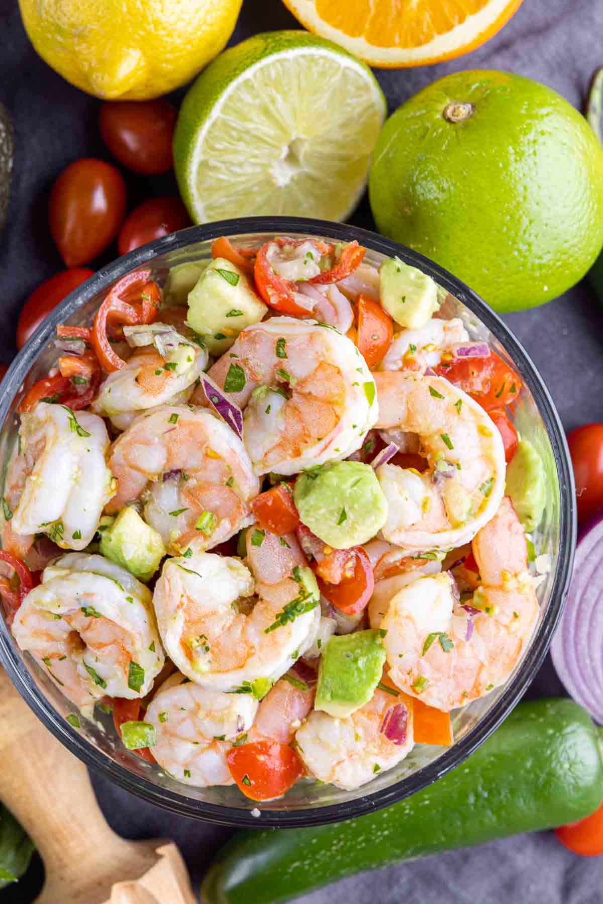 glass bowl with Shrimp Ceviche with limes