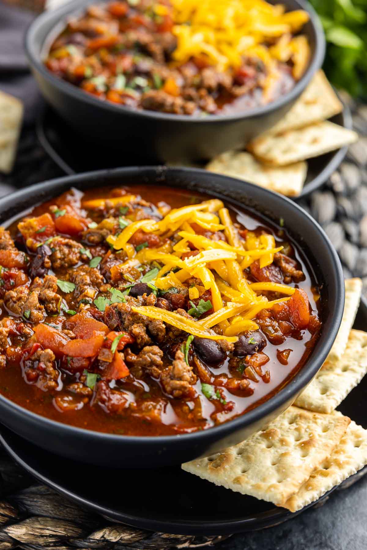 bowl with Smoky Chipotle Chili with crackers
